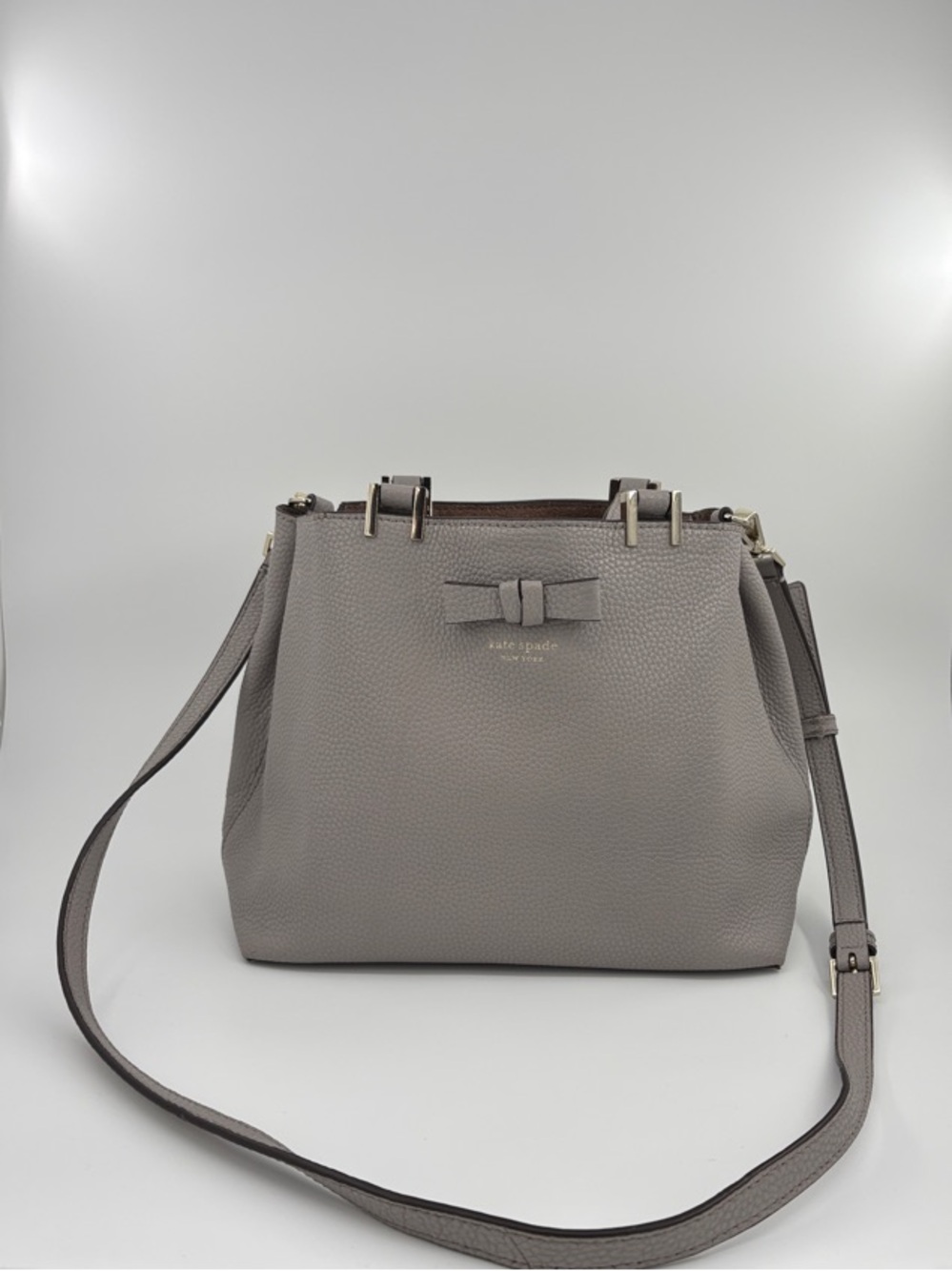 kate spade Pebble Leather Crossbody in Light Gray with Bow